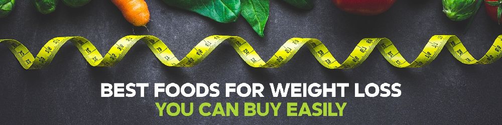 Healthy weight loss foods, including fruits, vegetables, oats, nuts, and protein-rich meals, on a table